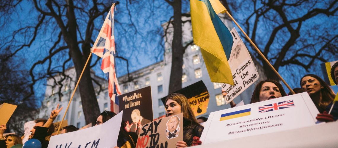 Protesters gather outside Downing Street in London to demand further sanctions on Russia following its invasion of Ukraine, February 25, 2022. Credit: Shutterstock / Sandor Szmutko.